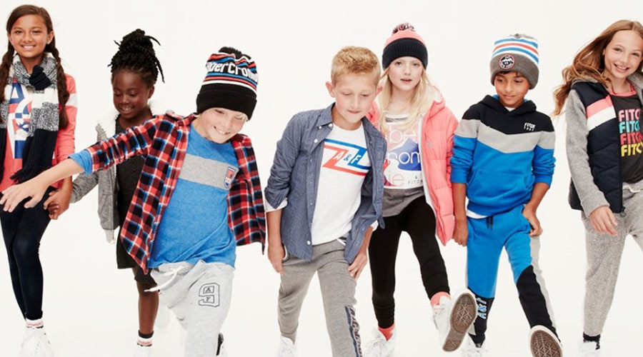 marketing image of children wearing Abercrombie Kids clothing against a white backdrop